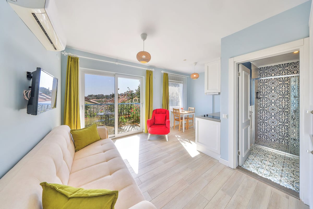 Family Suite, 1 Queen Bed with Sofa bed, Balcony, Garden View | 1 bedroom, Egyptian cotton sheets, premium bedding, desk