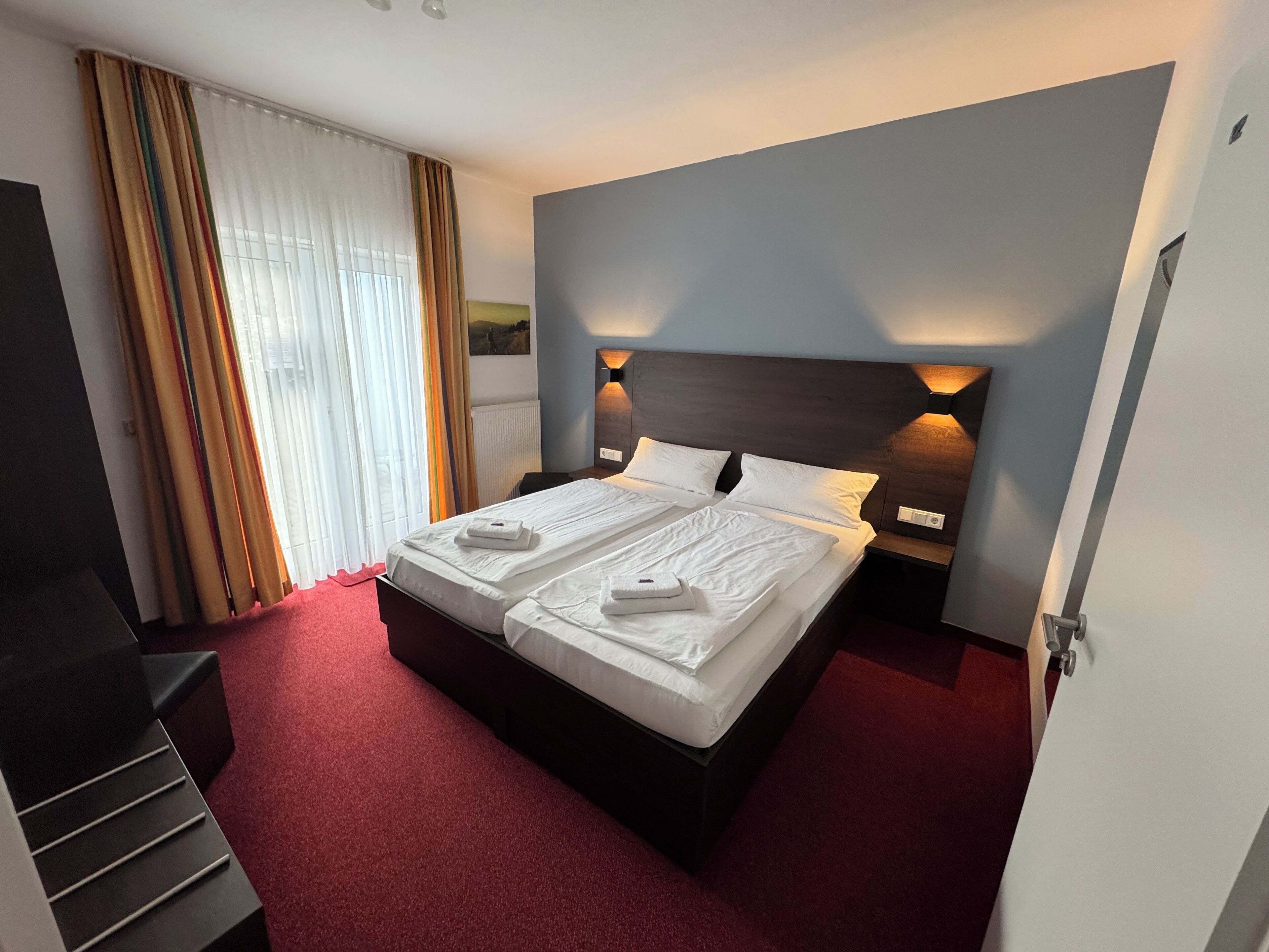 double or twin room | 2 bedrooms, minibar, desk, blackout curtains