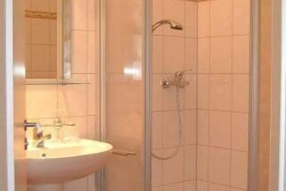 double or twin room | bathroom | shower, hair dryer, towels