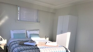 Deluxe villa, Meerdere bedden, niet-roken | Een strijkplank/strijkijzer, gratis wifi, beddengoed