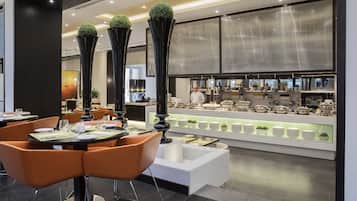 3 restaurants, breakfast, lunch, dinner served; international cuisine