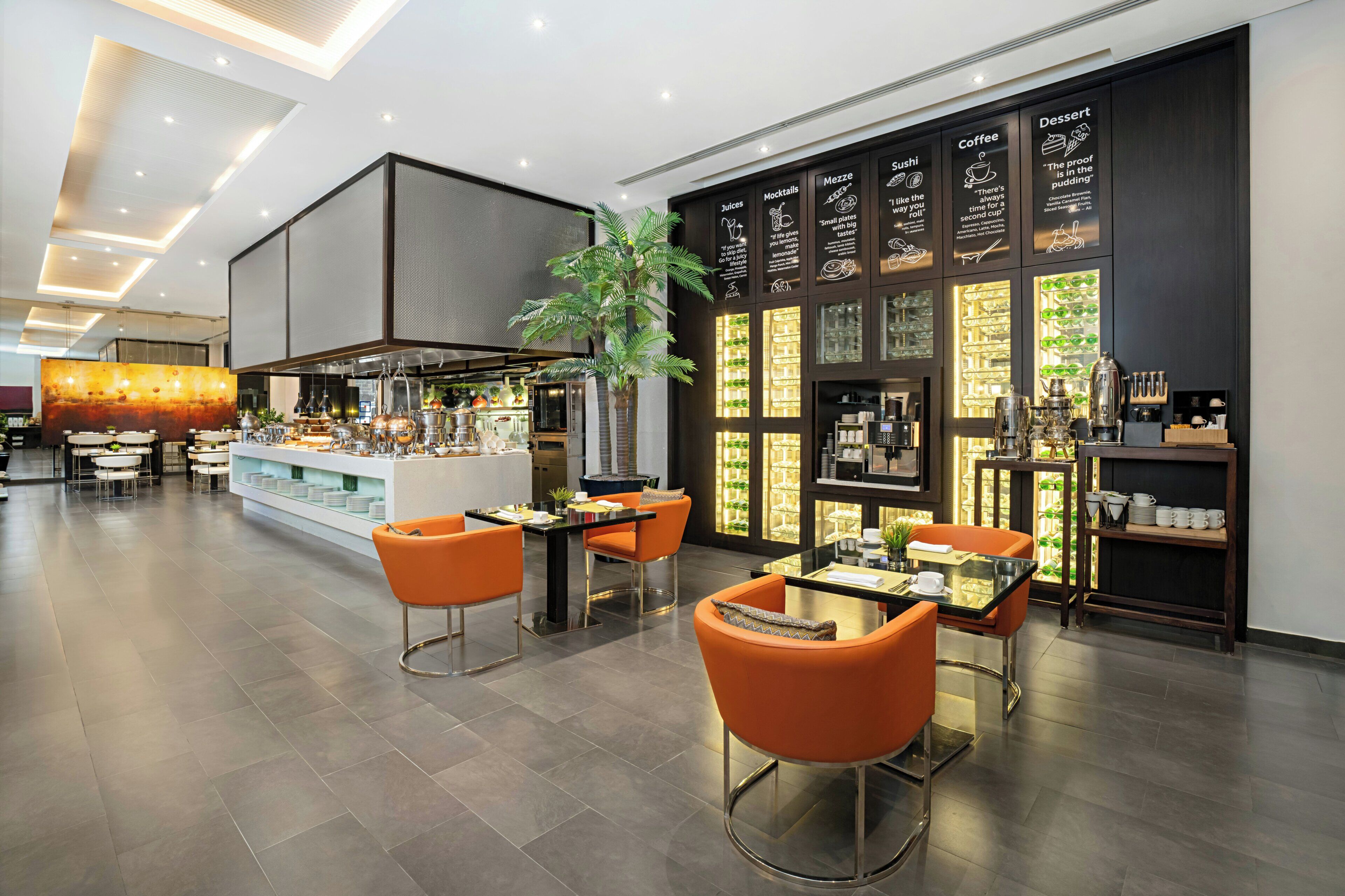 A modern restaurant interior with a bar area, seating, and a menu display.
