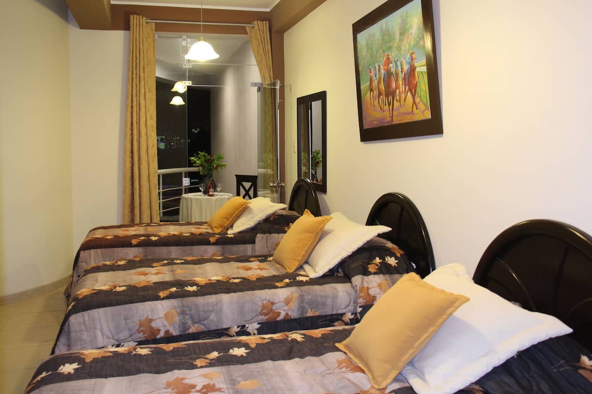 Triple Room | Minibar, in-room safe, desk, iron/ironing board (on request)