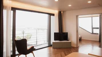 Premium House (# 3) | Living area | Flat-screen TV