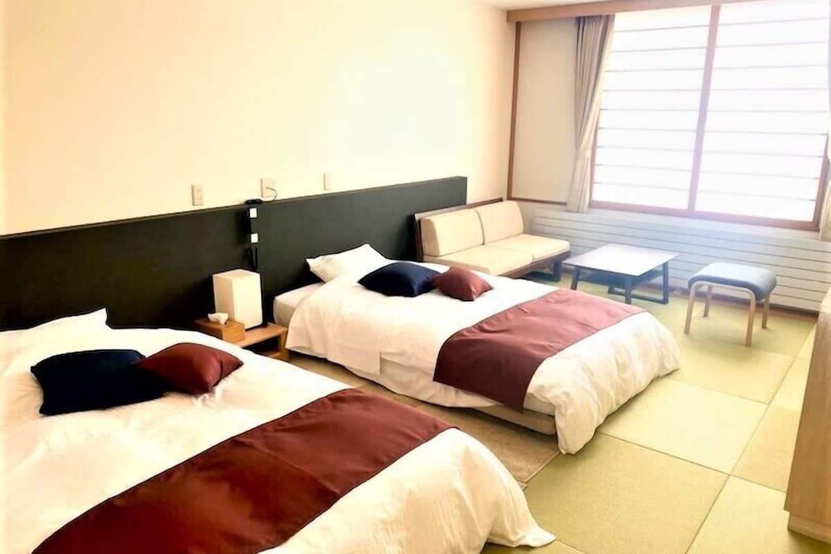 executive twin room, non smoking | 1 bedroom, in-room safe, desk, free wifi