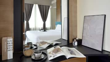 Premier Suite, Sea View | Minibar, in-room safe, blackout curtains, iron/ironing board