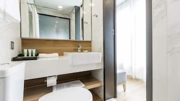 Shower, free toiletries, slippers, towels