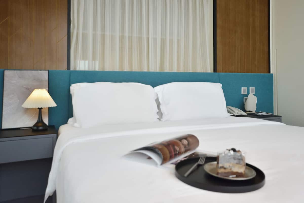 Premier Suite, City View | Minibar, in-room safe, blackout drapes, iron/ironing board