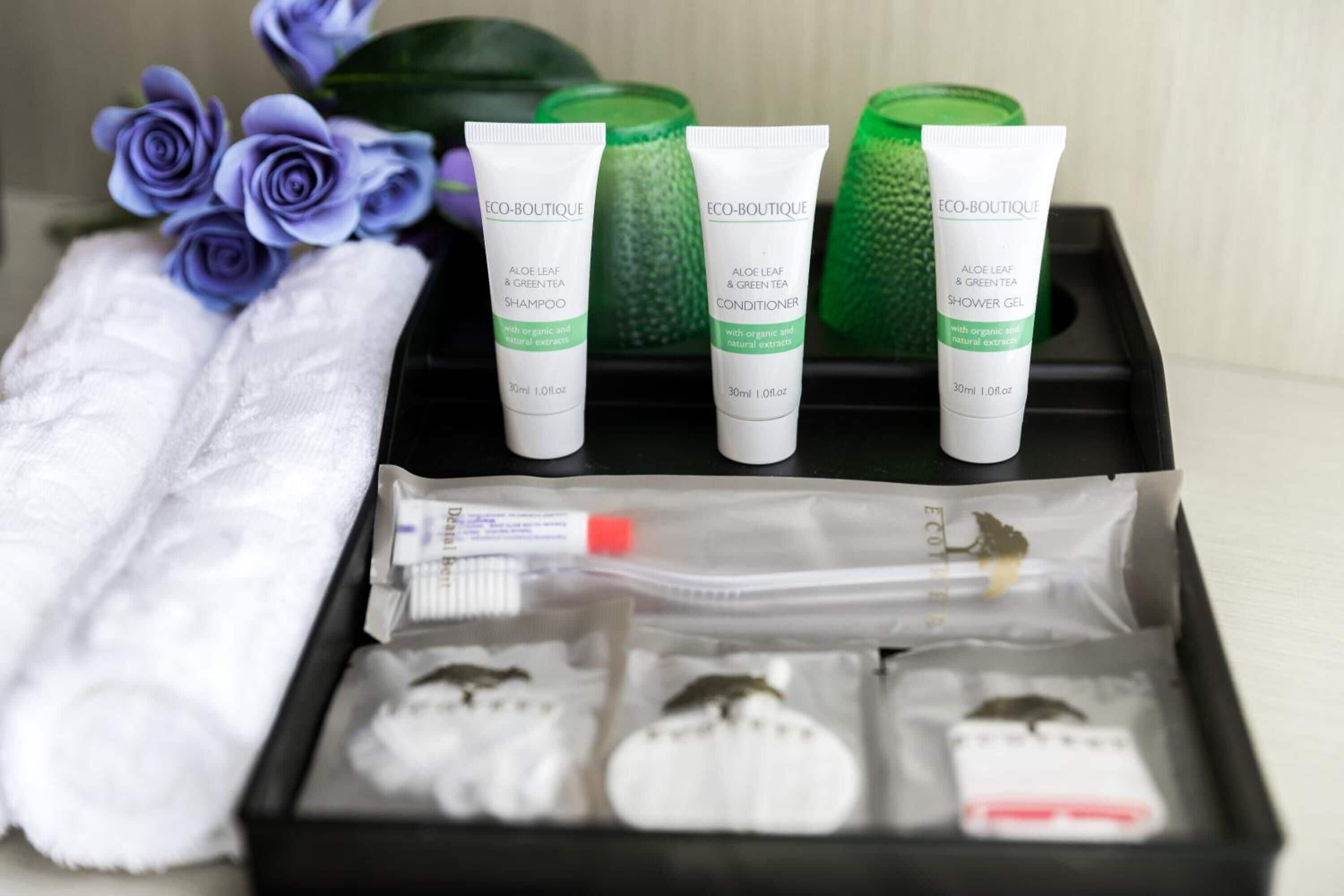 shower, free toiletries, slippers, towels