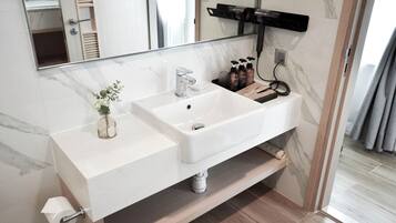 Shower, free toiletries, slippers, towels