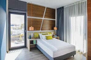 Premium bedding, desk, blackout curtains, soundproofing