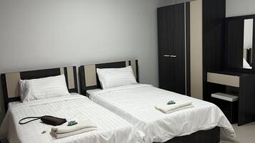 Twin Room | Blackout drapes, free WiFi, bed sheets