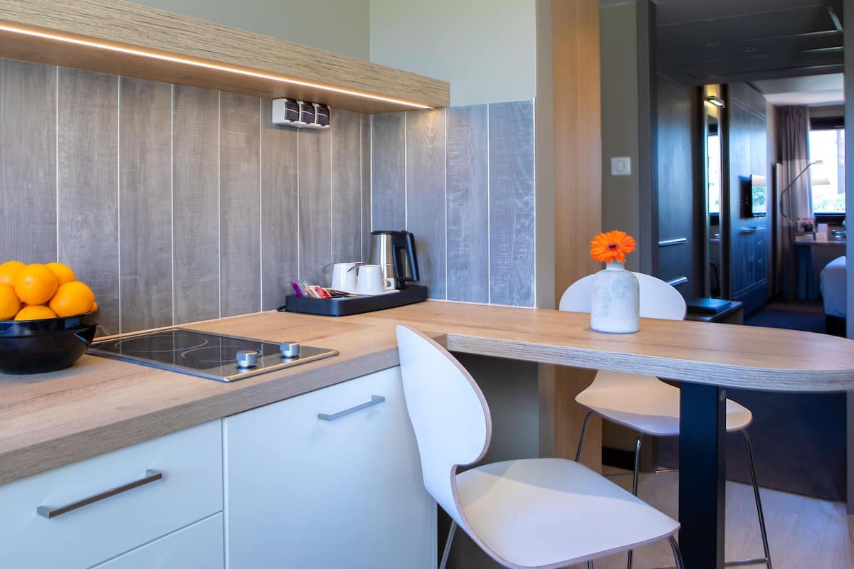 Family Room, Kitchenette | In-room safe, desk, laptop workspace, blackout curtains