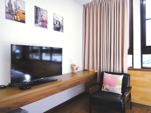 Elite tweepersoonskamer | Een bureau, verduisterende gordijnen, geluiddichte muren, extra bedden