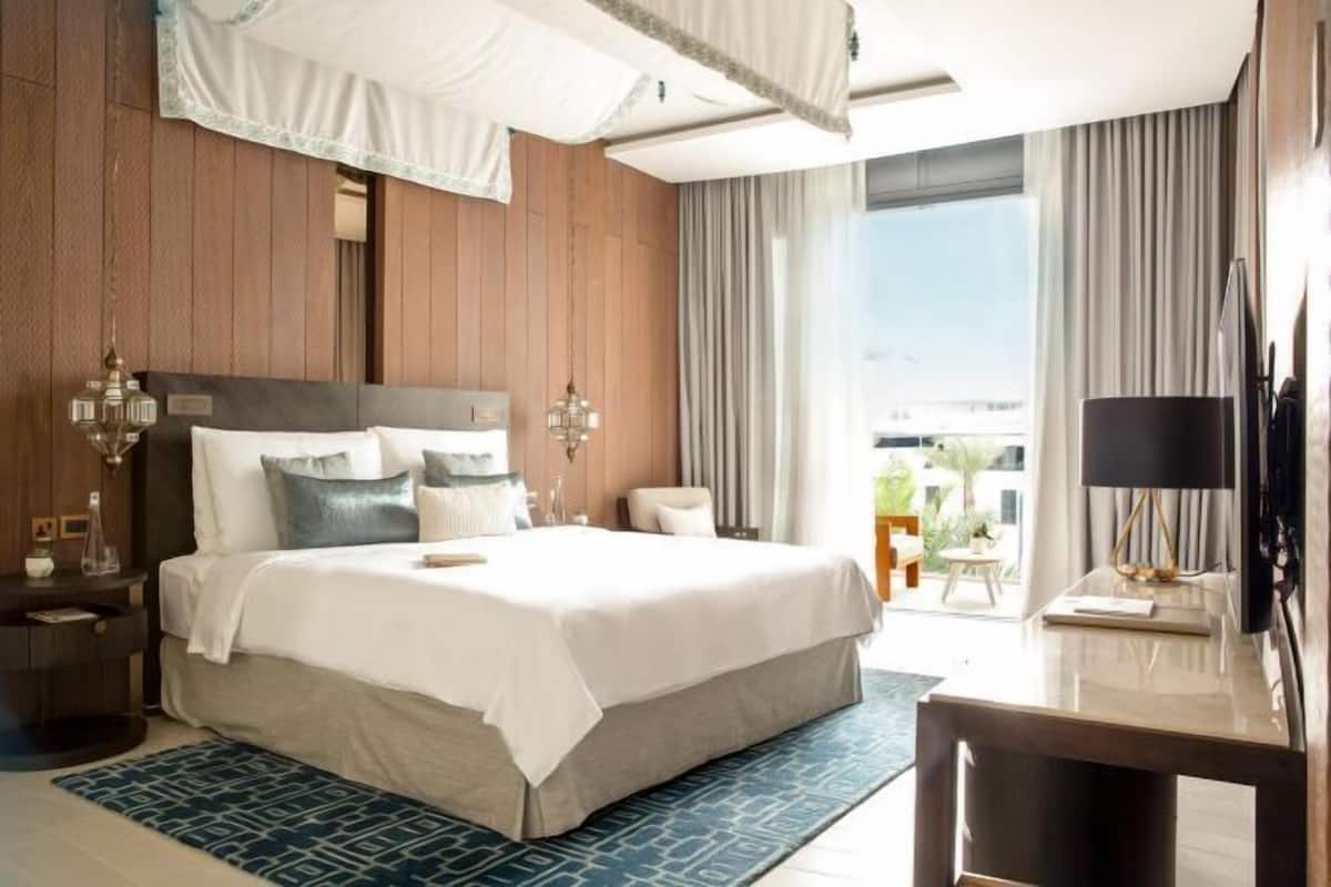 Premium bedding, down comforters, pillowtop beds, minibar