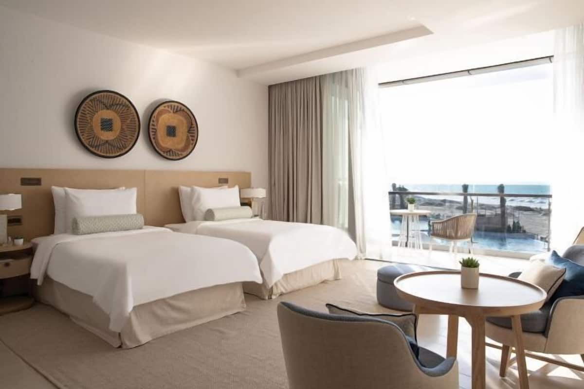 Premium bedding, down comforters, pillowtop beds, minibar