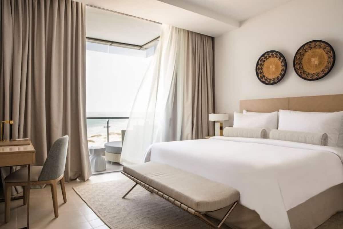 Premium bedding, down comforters, pillowtop beds, minibar
