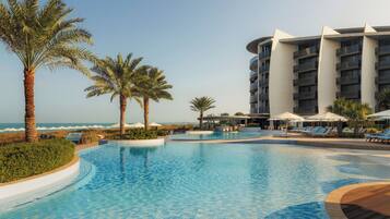 3 outdoor pools, open 7:00 AM to 6:00 PM, pool umbrellas, pool loungers