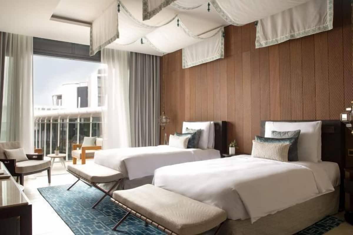 Premium bedding, down comforters, pillowtop beds, minibar