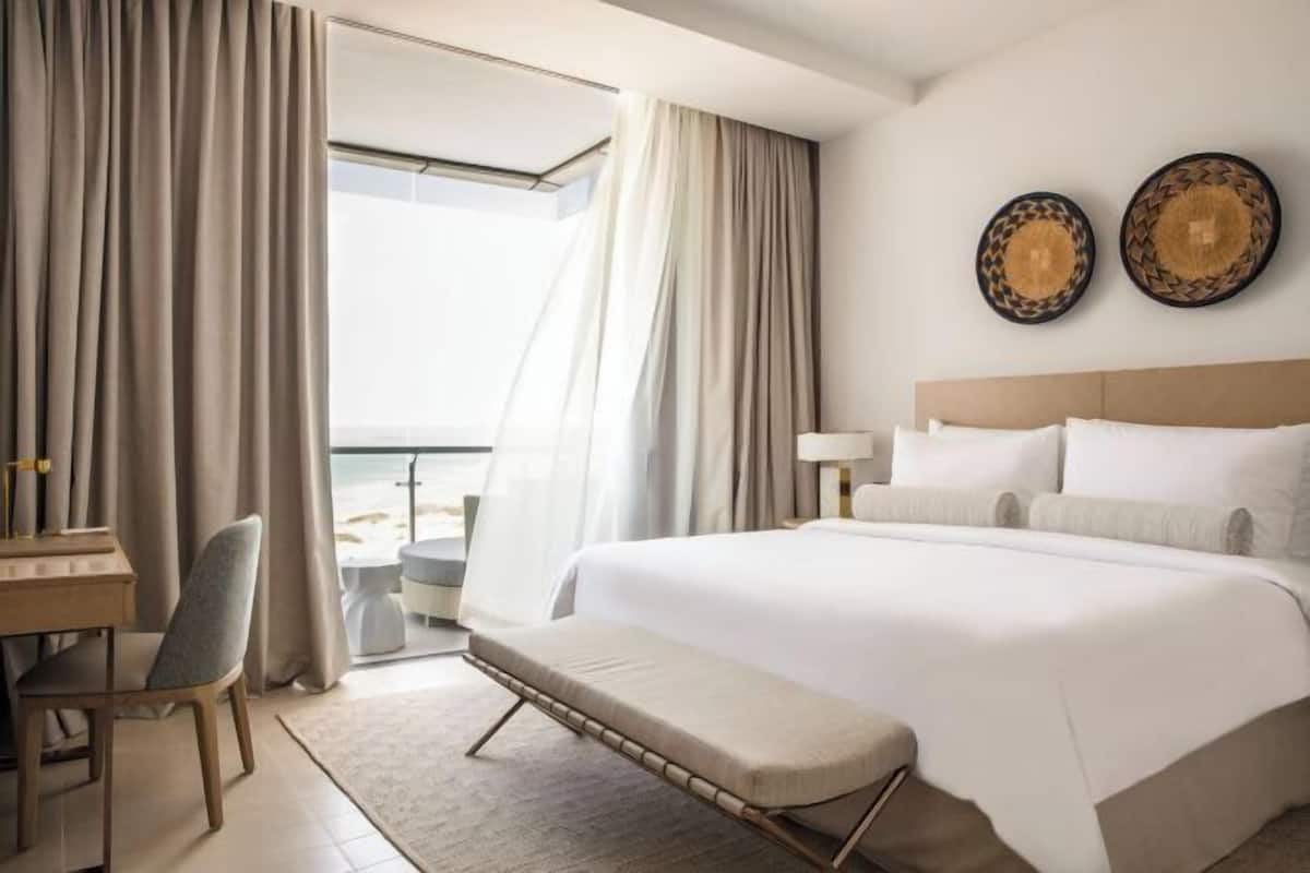 Premium bedding, down comforters, pillowtop beds, minibar