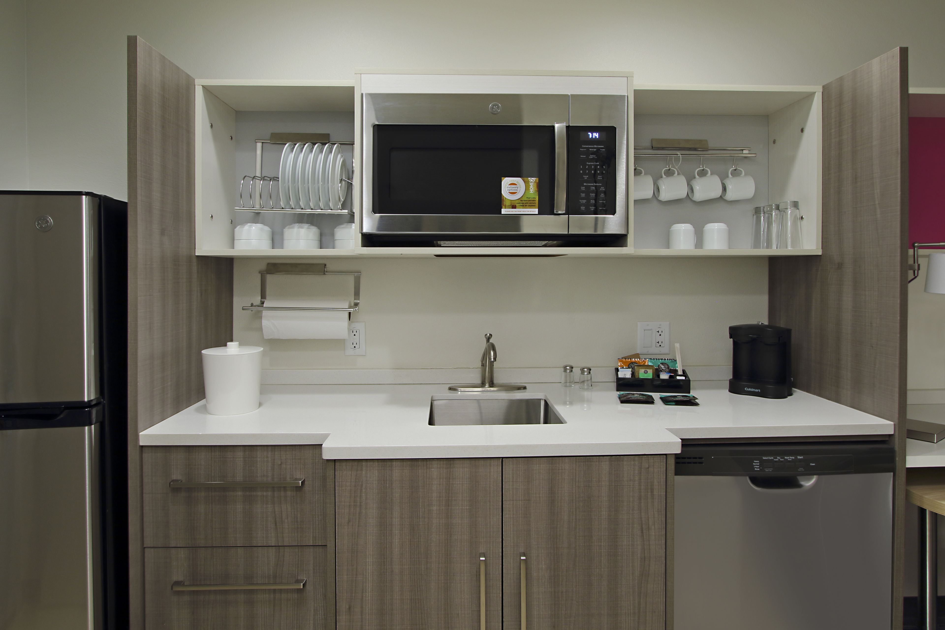 full-sized fridge, microwave, dishwasher, coffee/tea maker