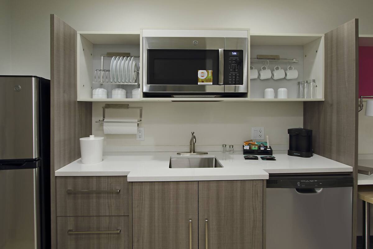 full-sized fridge, microwave, dishwasher, coffee/tea maker