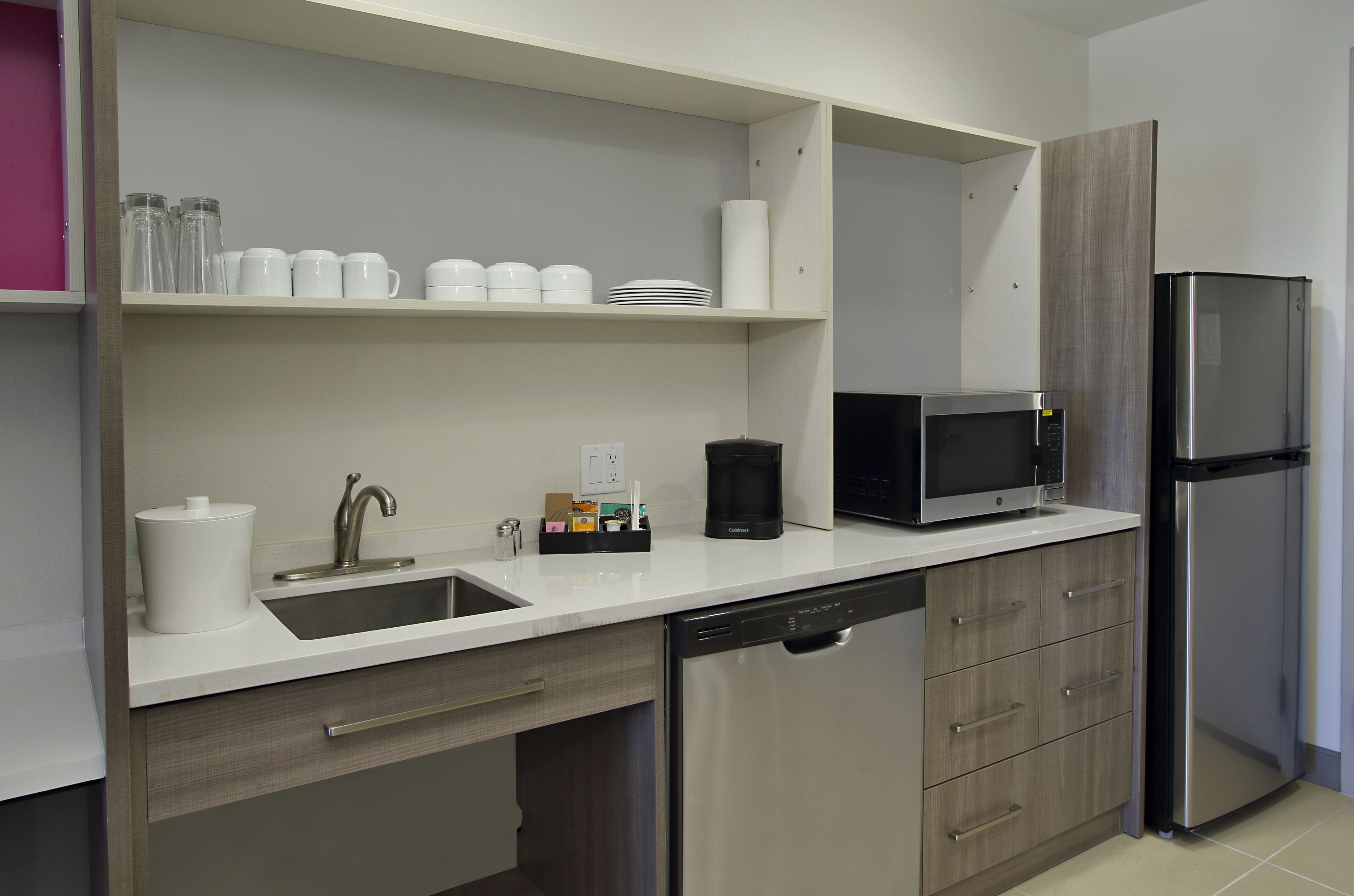 full-sized fridge, microwave, dishwasher, coffee/tea maker