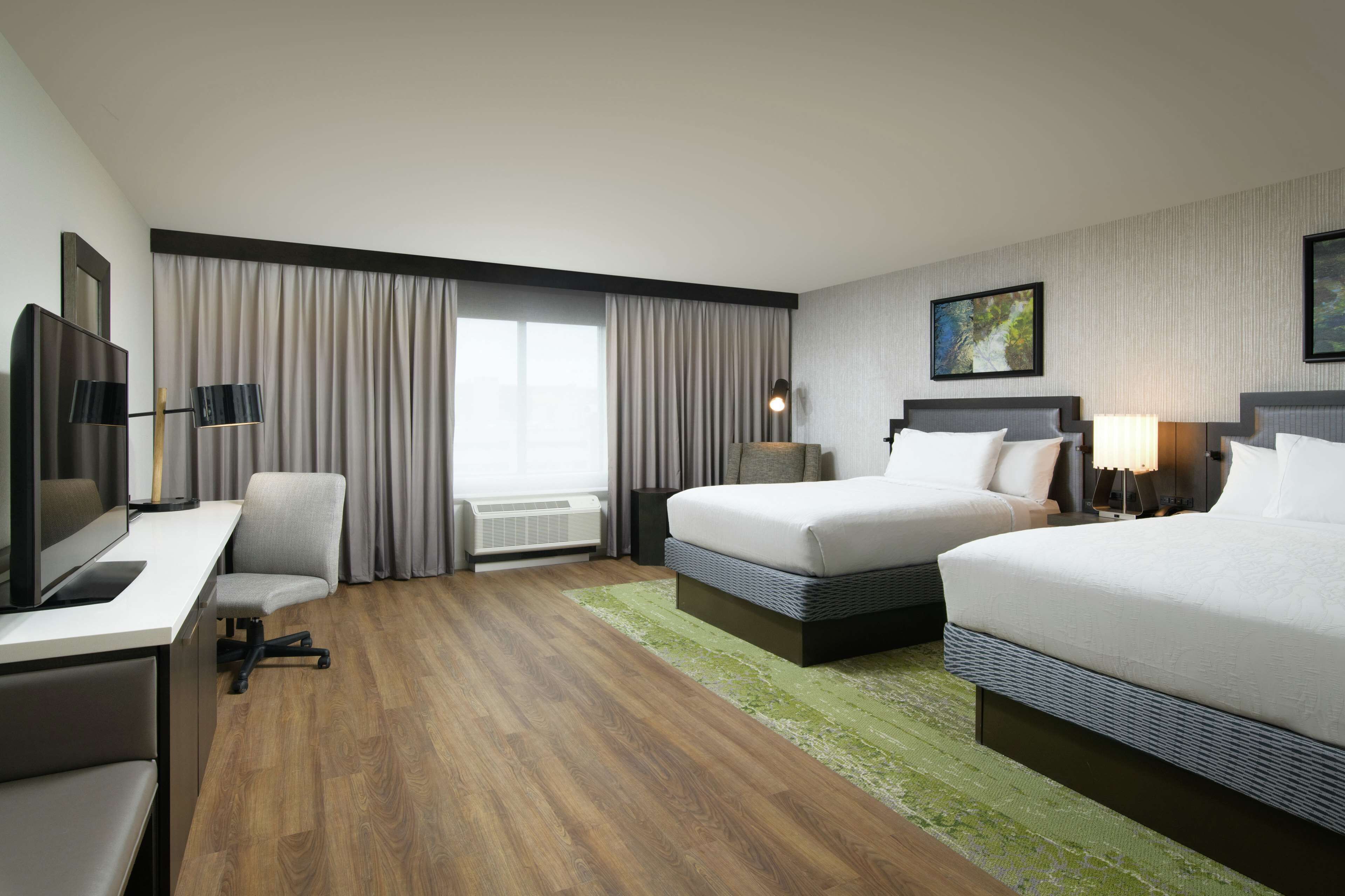 deluxe room, 2 queen beds, non smoking | 1 bedroom, in-room safe, desk, laptop workspace