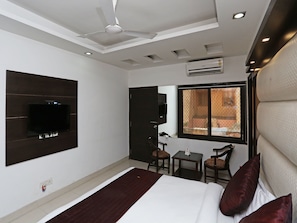 Habitación Deluxe con 1 cama matrimonial o 2 individuales, 1 cama King size, para fumadores | Wifi gratis