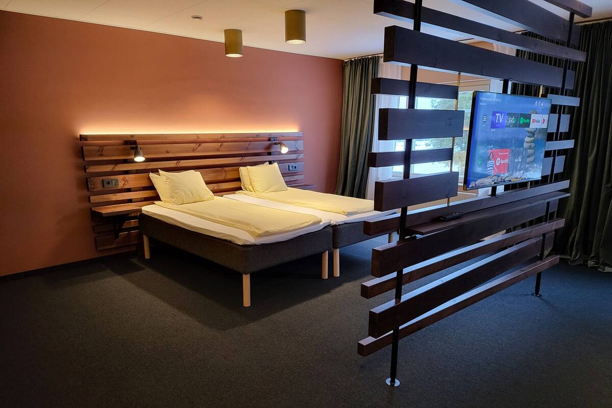 Desk, laptop workspace, blackout curtains, free WiFi