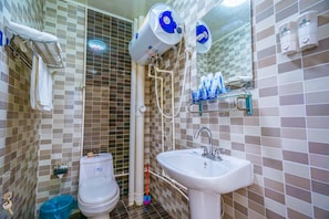 Shower, free toiletries, hair dryer, slippers