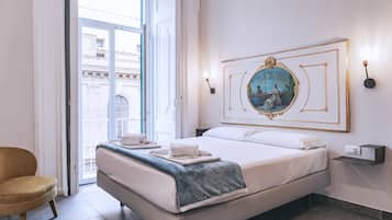 Superior Triple Room | Minibar, in-room safe, desk, soundproofing