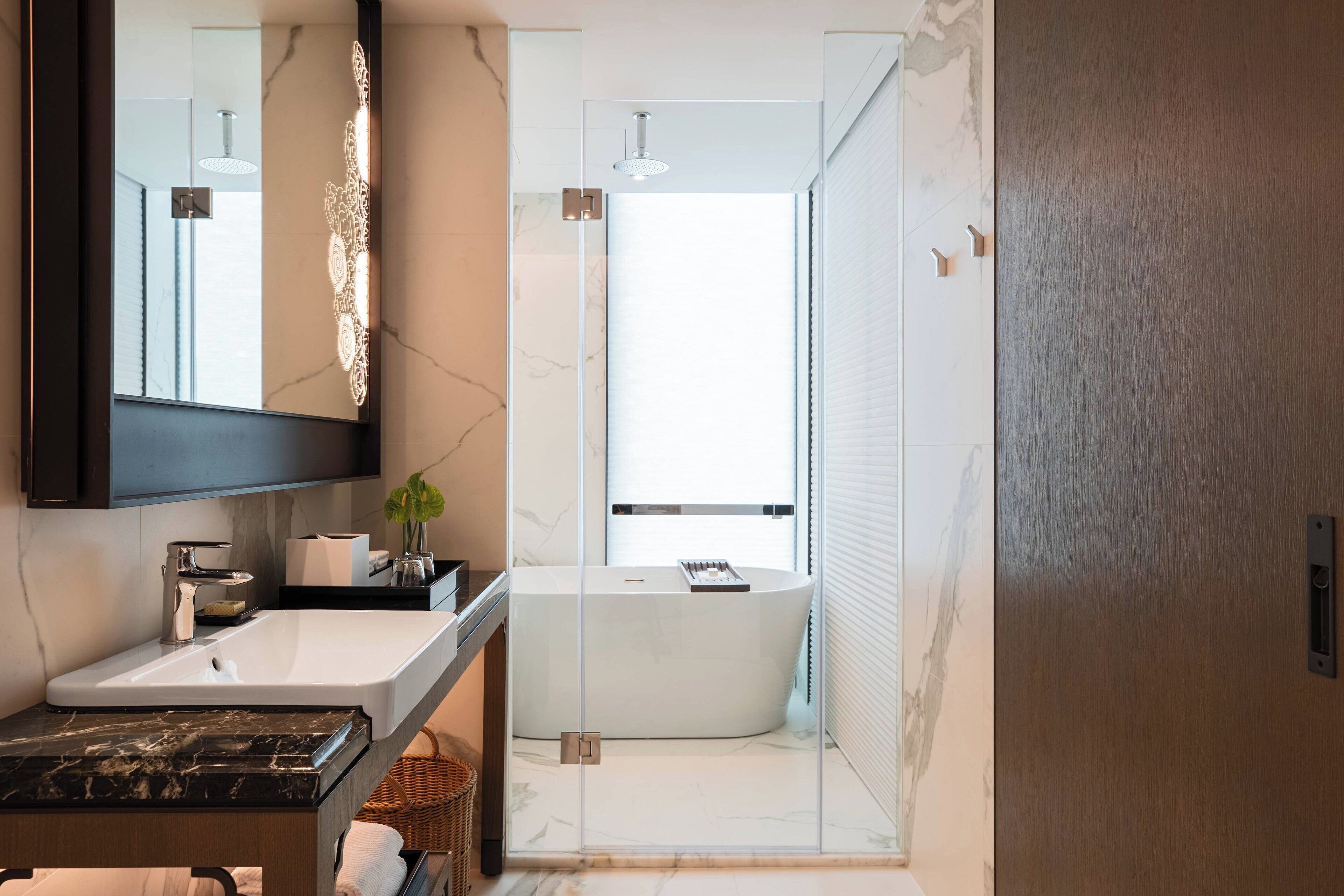 separate bathtub and shower, deep-soaking bathtub, rainfall showerhead