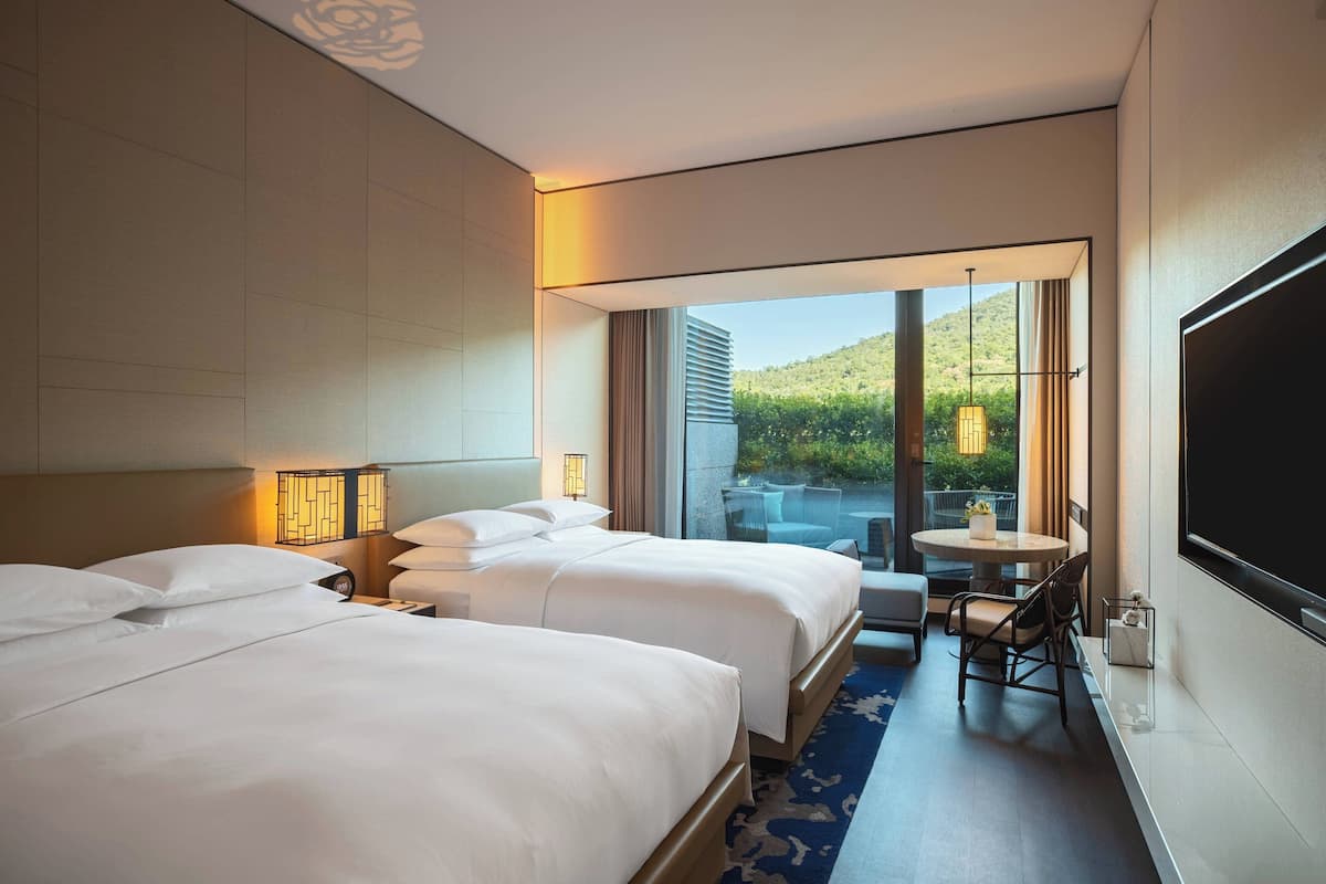 Hypo-allergenic bedding, down duvets, free minibar items, in-room safe
