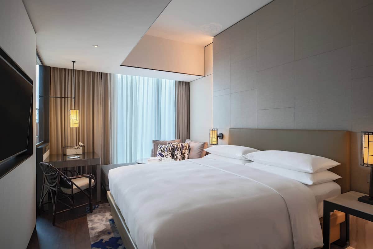 Hypo-allergenic bedding, down duvets, free minibar items, in-room safe