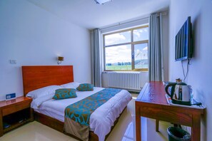 Standard Double Room | Desk, blackout drapes, free WiFi - Yijie Holiday Hotel Fengning Lazhaying (Chengde)