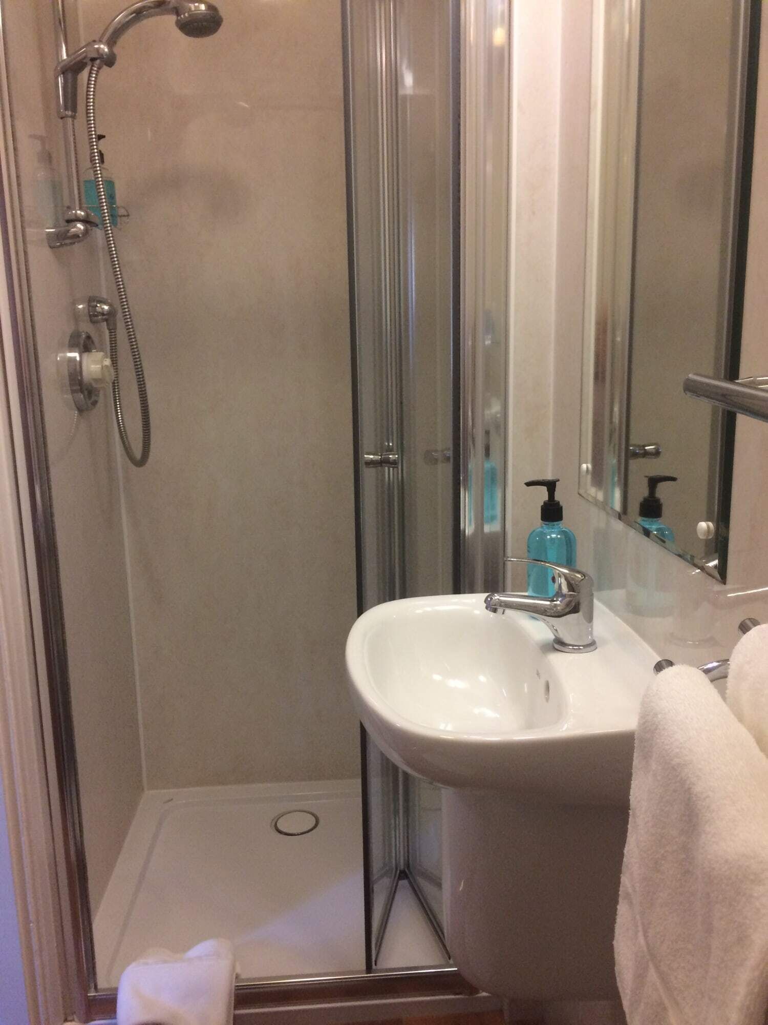 shower, towels, soap, shampoo