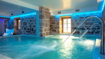 Indoor pool, seasonal outdoor pool, open 9 AM to 8 PM, pool umbrellas