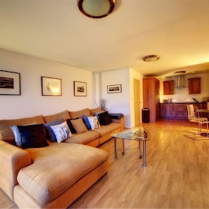 Appartement Deluxe | Coin séjour | Télévision à écran plat