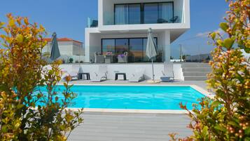 Outdoor pool, sun loungers