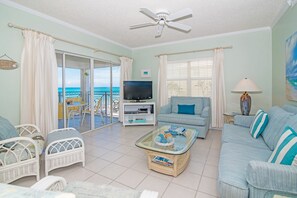 Deluxe Condo, Patio, Sea View | Living area - Regal Beach Club #122 by Cayman Vacation (Seven Mile Beach)