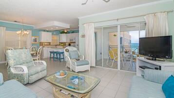 Deluxe Condo, Patio, Sea View | Living area | Flat-screen TV, DVD player