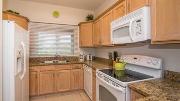 Deluxe Condo, Patio, Sea View | Private kitchen | Fridge, microwave, oven, stovetop