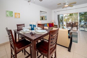 Deluxe Condo, Patio | In-room dining - Colonial Kai by Cayman Vacation (North Side)