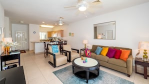 Deluxe Condo, Patio | Living area - Colonial Kai by Cayman Vacation (North Side)