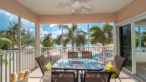 Deluxe Condo, Patio | Terrace/patio - Colonial Kai by Cayman Vacation (North Side)