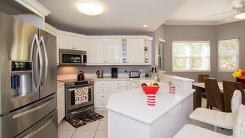 Deluxe Condo, Patio, Sea View | Private kitchen | Fridge, microwave, oven, stovetop