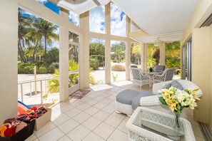 Deluxe Condo, Patio, Lagoon View | Terrace/patio - Island House #12 by Cayman Vacation (North Side)