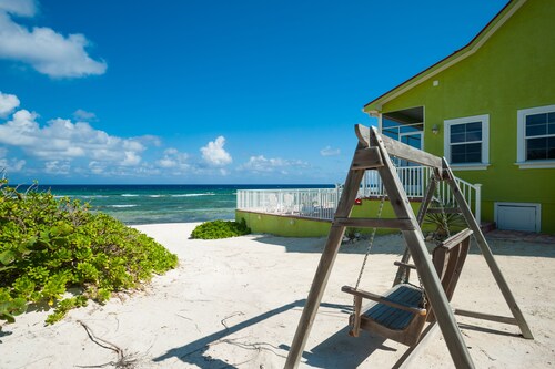 Parrot-ise Villa by Cayman Vacation