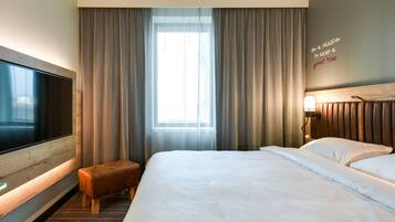 Desk, blackout curtains, soundproofing, free cots/infant beds